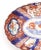 An imari oval dish with scalloped rim, Japan, 19th century.