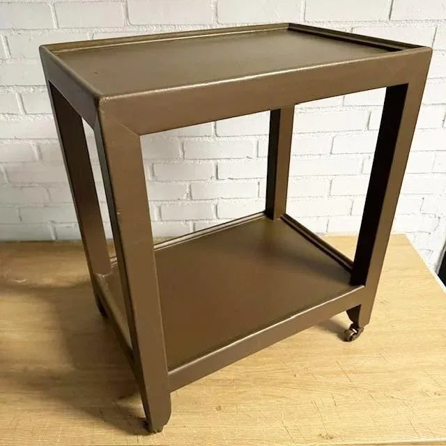 Karl Springer Telephone “ Duchess” Table Measures 20 x 24 x 24 inches tall. Covered totally in a beautiful and unusual...