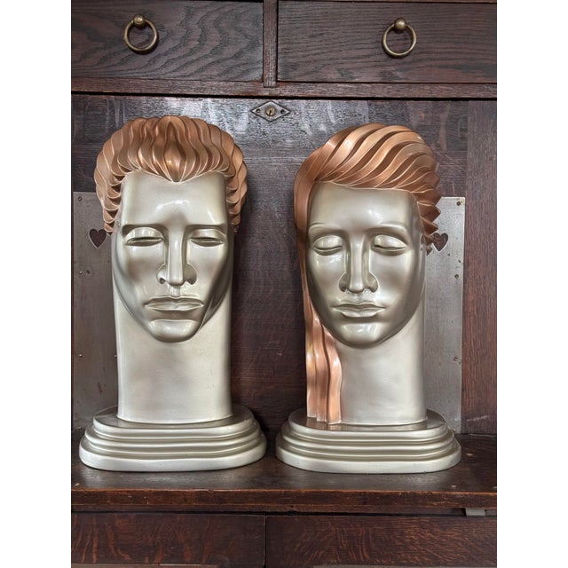 “Head of a Man” and “Head of a Woman” were originally designed by Lora Marx in 1937 for the Tavern Club in Chicago, IL....