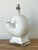 This striking vintage table lamp is a masterclass in Postmodern Coastal design, featuring a large, sculptural nautilus...
