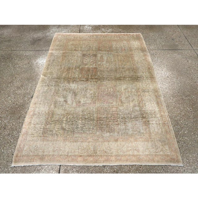 This Mid-20th century Turkish Sivas rug, measuring 4' 0" x 5' 6", showcases the refined artistry and elegance for which...