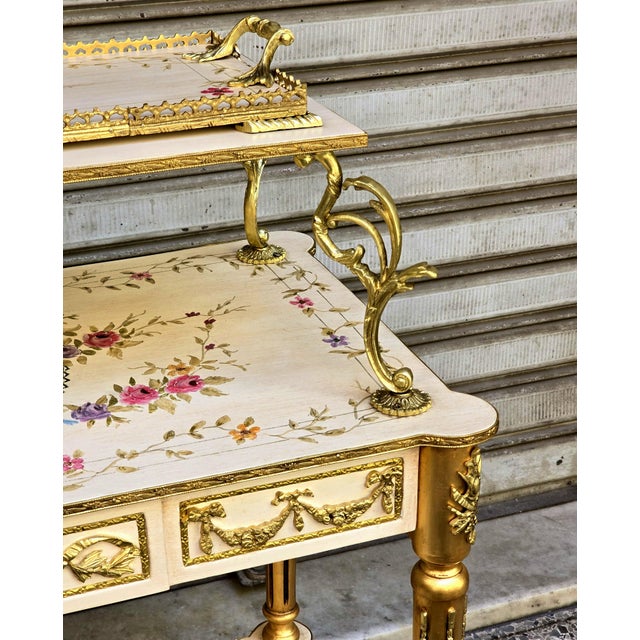 Add a refined European touch to your interior with this French-style white serving table, featuring a beautifully finished...