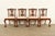 An outstanding set of four Chippendale or Georgian style side chairs or dining chairs In the manner of Baker Furniture...