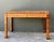 Evoking the refined organic aesthetic of Bielecky Brothers, this vintage writing desk features a tightly wrapped pencil...