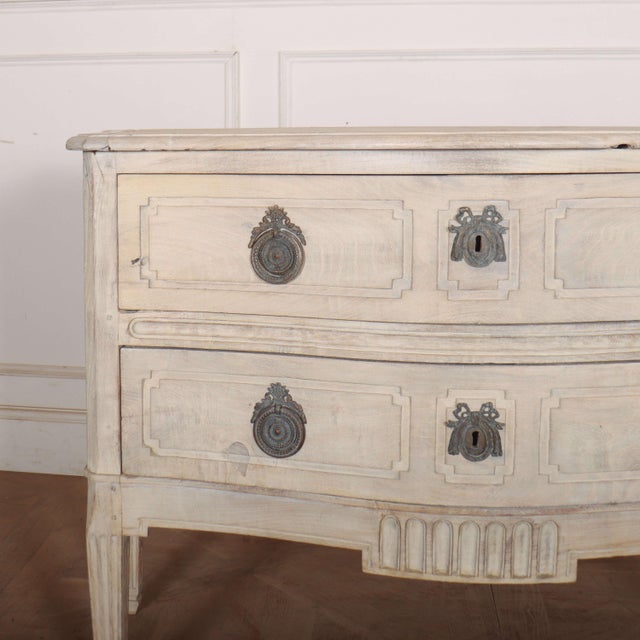 Pretty 18th century Italian serpentine front two drawer bleached oak commode. 1790. This piece is designed in the style of...