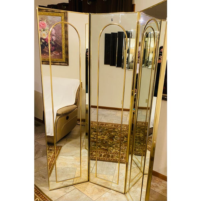 This very heavy and sturdy Hollywood Regency mirror is the epitome of timeless elegance, and a three-panel design takes...