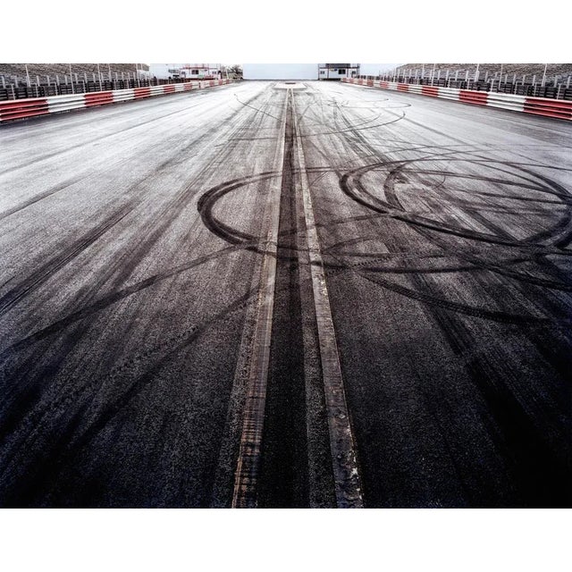 Race Track is a dynamic C-Type Matte Print by Contemporary photographer Chris Frazer Smith and is available in this size...