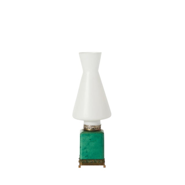 A set of mid-century console lamps designed by Aldo Tura and manufactured by Tura Creazioni in Milano in the...