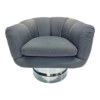 Mid-Century Swivel Club Chair on Polished Steel and Brass Base For Sale