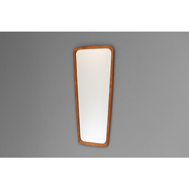Tapered Danish wall mirror in an oak frame, original glass. Denmark circa 1960.
