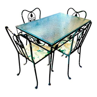 1986 Cast Iron Outdoor Garden Dining Set With Original Pebble Textured Semi Opaque Glass Top - Set of 5 For Sale