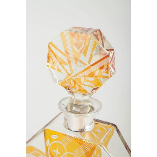 Swedish Art Deco decanter in crystal glass with silver mounting, 1920/30s. Facetted Art Deco decanter in cut and decorated...