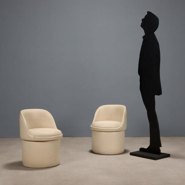 Pair of armchairs with opening seat for storage compartment, wooden frame, foam padding, skai upholstery. This piece is...