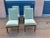 Mid century dining chairs. Made by Sux of Sweden. Chairs were newly upholstered in a teal chenille. The bases are teak....