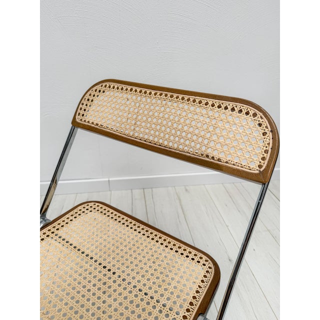 Original plia folding chair from the 1960s, designed by giancarlo piretti for anonima castelli. Chrome metal frame with...