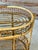 Elevate your entertaining space with this striking mid-century modern Italian rolling bar cart, designed in the...