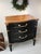• Style: French Provincial (French country) with elegant curves and charming details. • Finish: Rich black body with a...