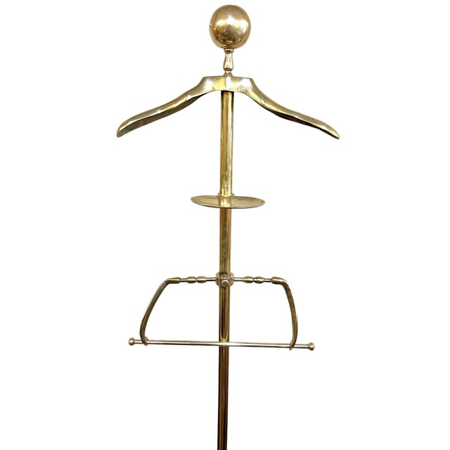 Vintage brass valet by Decorative Crafts Inc of New York. There is a place for everything on this fabulous mid century...