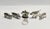 Collection of six silver pigs & wild boar a delightful collection of six miniature pigs and wild boar in solid silver with...