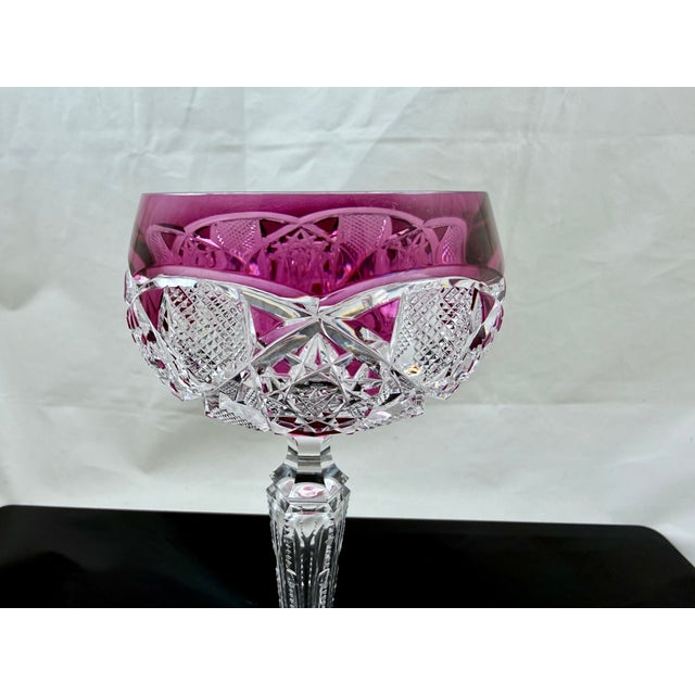 Val St Lambert was known for their quality cut glass. Aside from the exquisite cut on the bowl, the stem is notched on all...