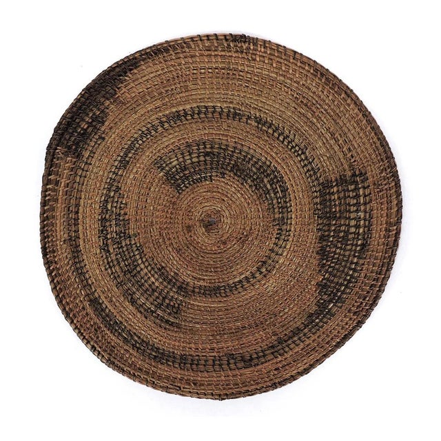 Tutsi tight-weave flat baskets, renowned for their exquisite craftsmanship, are among the most prized artworks produced by...
