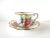 A vintage teacup and saucer set with pink, purple, and white lilacs. Marked: Royal Stafford Bone China, "Carousel", Made...