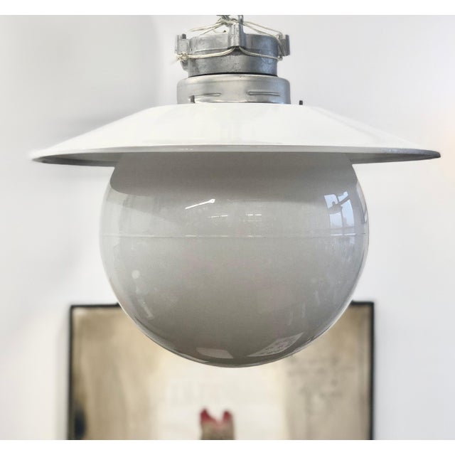 Flush mount outdoor light designed by Paavo Tynell for Idman Oy, Model H10-100. Finland, circa 1950th. Large glass bawl...