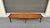 Hang ten with this beautiful mid century surfboard style coffee table. This piece features beautiful walnut grain with...