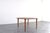 This teak coffee table was designed in the 1960s by a pair of Norwegian designers Rolf Rastad and Adolf Relling and...