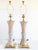 Pair of stunning Palm Beach style tall porcelain and brass fitting lamps by Wilwood. The lamp from are inspired by the...