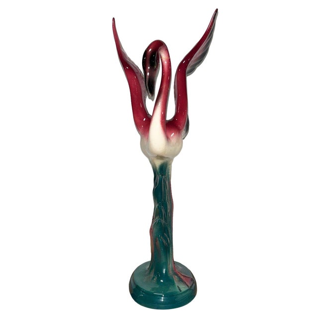 Mid-century pink and green ceramic Mother and child tabletop pottery statue. The statue features a beautifully detailed...