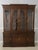 Vintage solid cherry china cabinet with 4 arched windows atop 4 raised paneled doors. This is an American-made display...