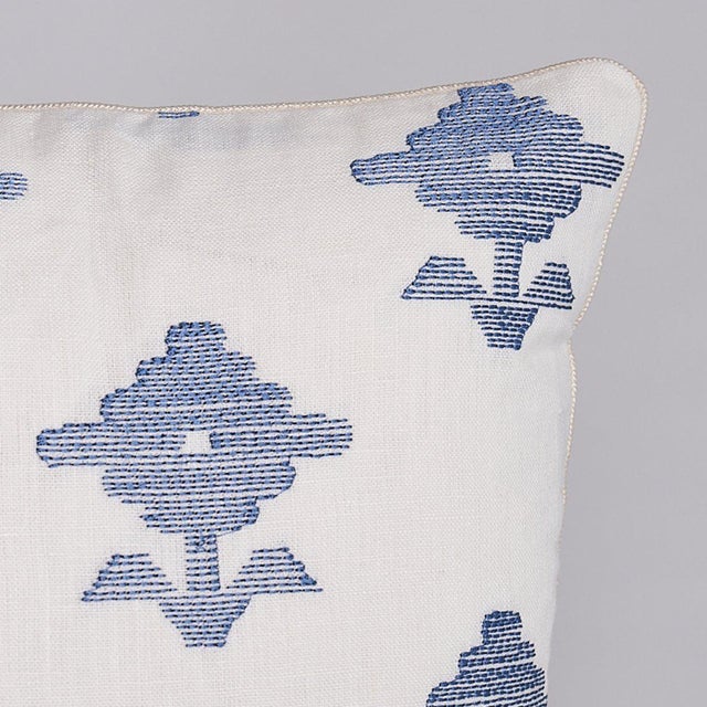 This pillow features Rubia Embroidery. Made on a 100% linen ground, the stylized flowers are rendered in an irregular...
