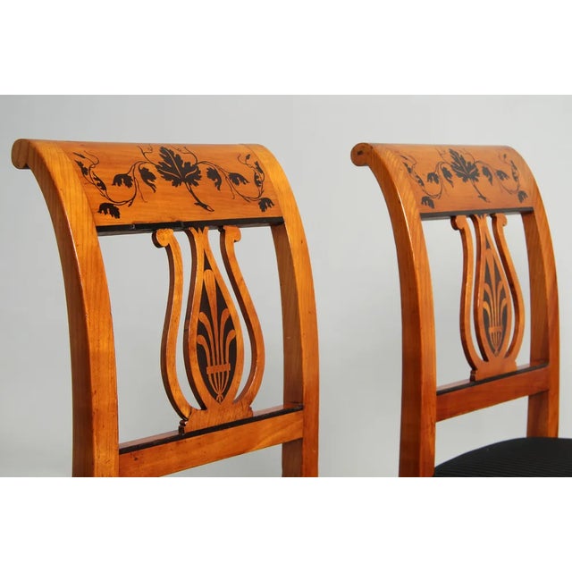 Set of six Biedermeier chairs with vine leaf inlays Rhineland-Palatinate Cherry tree Biedermeier around 1830 Dimensions: H...