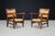 Pair of French Oak and Rush Lounge Armchairs, France, 1950s A highly characterful pair of French lounge armchairs dating...