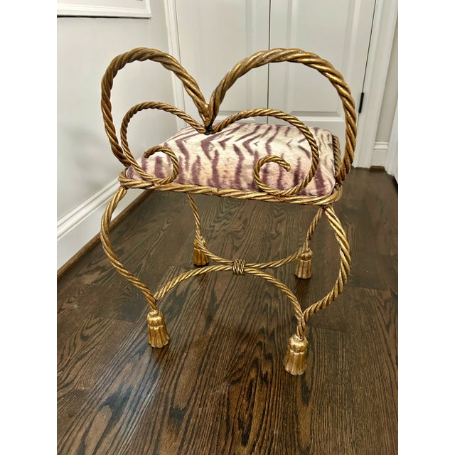 Charming vintage Italian rope and tassel vanity stool with gilt metal frame and heart-shaped back. The twisted rope design...