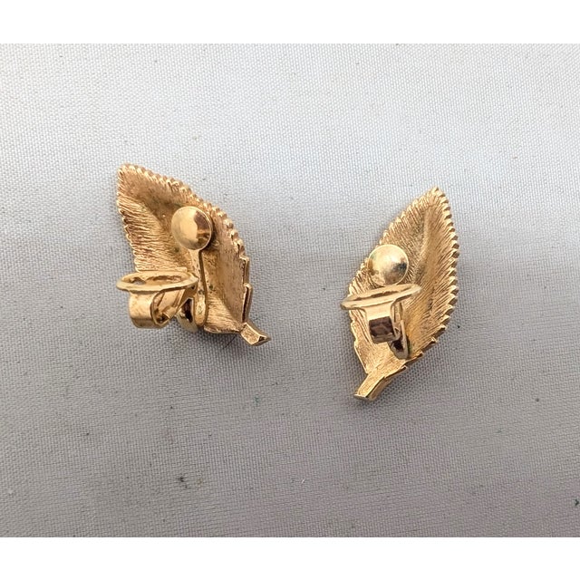 Vintage 1960s Signed Crown Trifari Goldtone Clear Rhinestone Leaf Clip Earrings-2 Pieces For Sale - Image 10 of 12