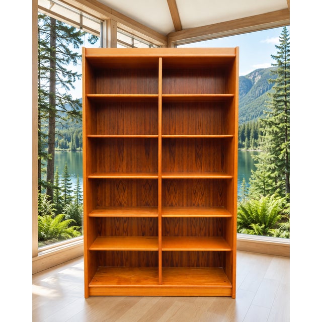 Very nice vintage teak double bookcase with adjustable shelves. Great size to hold or display tons of whatever. This piece...
