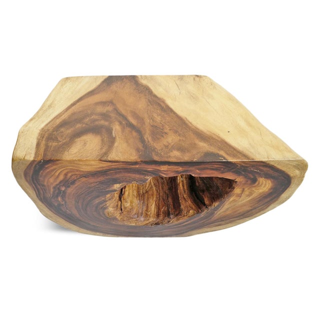 Beautiful organic monkey pod / suar wood side table. Natural freeform shape with center hole that has been sanded smooth...