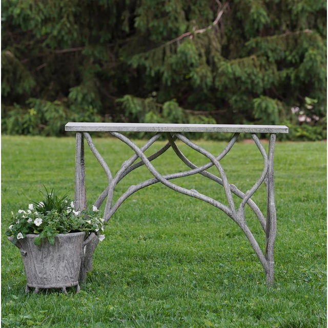 New special order item. Not vintage. The elegant, organic shape of the fake-wood base makes the Faux Bois Console a...