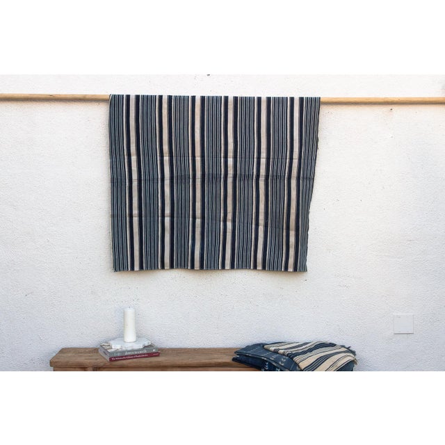 Hand-woven by master weavers of the Mossi and Dioula traditions in Burkina Faso, West Africa, these vintage textiles are...