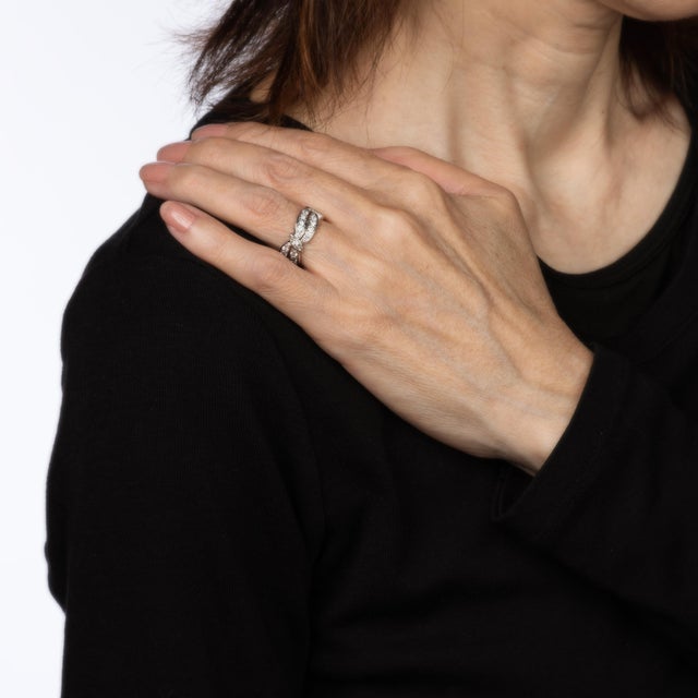 This is part of Chairish’s Fine Jewelry assortment. Elegant vintage diamond eternity ring (circa 1950s to 1960s), crafted...