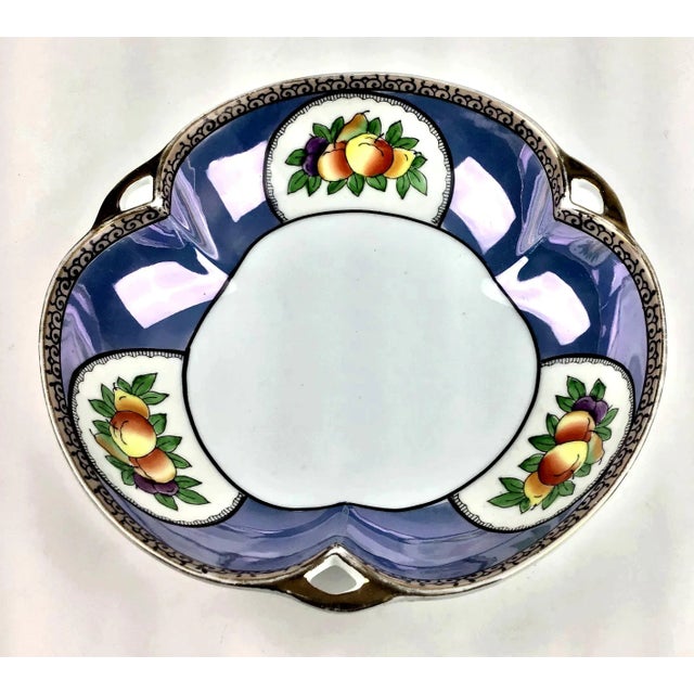 Bright colorful fruit design inside a blue lustreware scallop design bowl. Made in Japan in wonderful vintage condition.