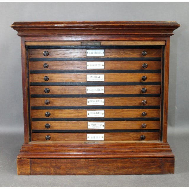 A beautiful Late 19th century French Napoleon III cigar humidor chest with 7 drawers and porcelain tags. Original key...