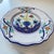 This hand-painted ceramic plate is a piece from the Faenza collection by Artistica - Deruta of Italy. This traditional...