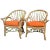 Mid-Century Circle Sided Rattan Armchairs - a Pair For Sale