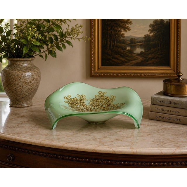 An absolute showstopper for the discerning modernist collector, this exhibition-scale mid-century Murano glass console...