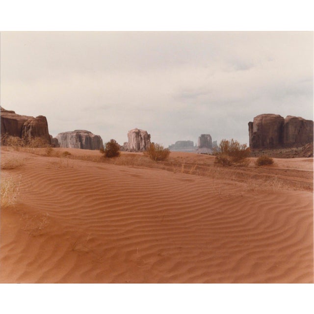 Photograph of Monument Valley by an unknown artist. Signed "CJB" in the lower right corner. Dated "April '84" in the lower...