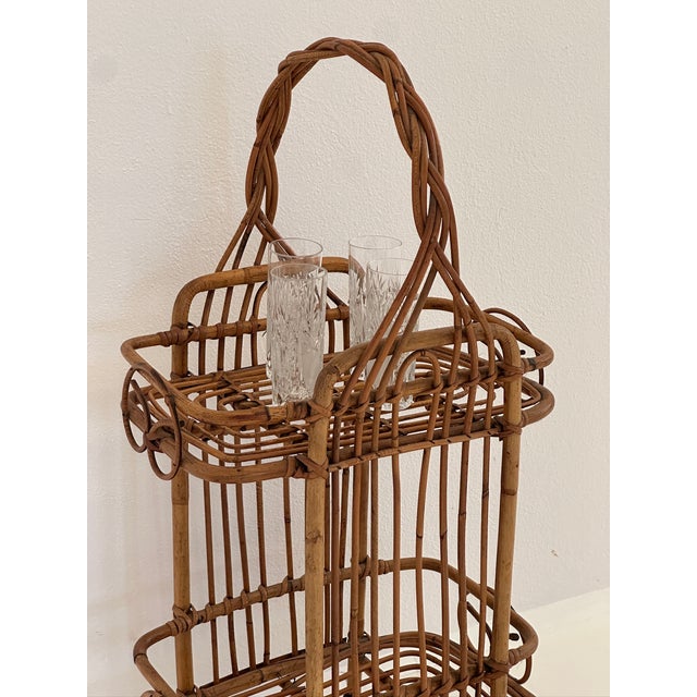 Simple and elegant trolley, produced by Norda, late 1980s. Made with a wooden frame and two forest green plastic shelves;...
