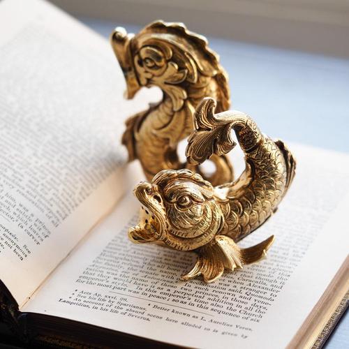 Exquisite pair of solid (925 sterling) silver-gilt salt and pepper shakers made early/mid 20th century, German origin. The...